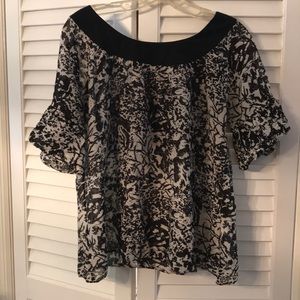 Blouse with just a little ruffle sleeve.